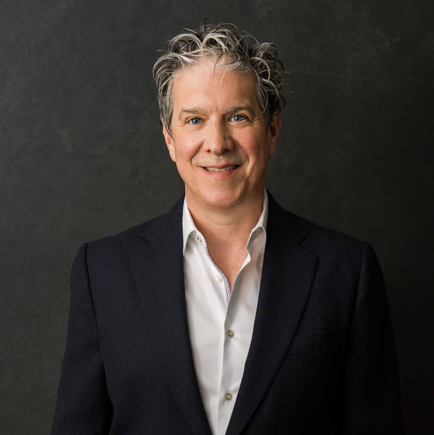 Portrait of Michael Holtz in a dark jacket